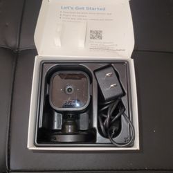 Blink Mini Compact Indoor Plug-In Smart Security Camera. 