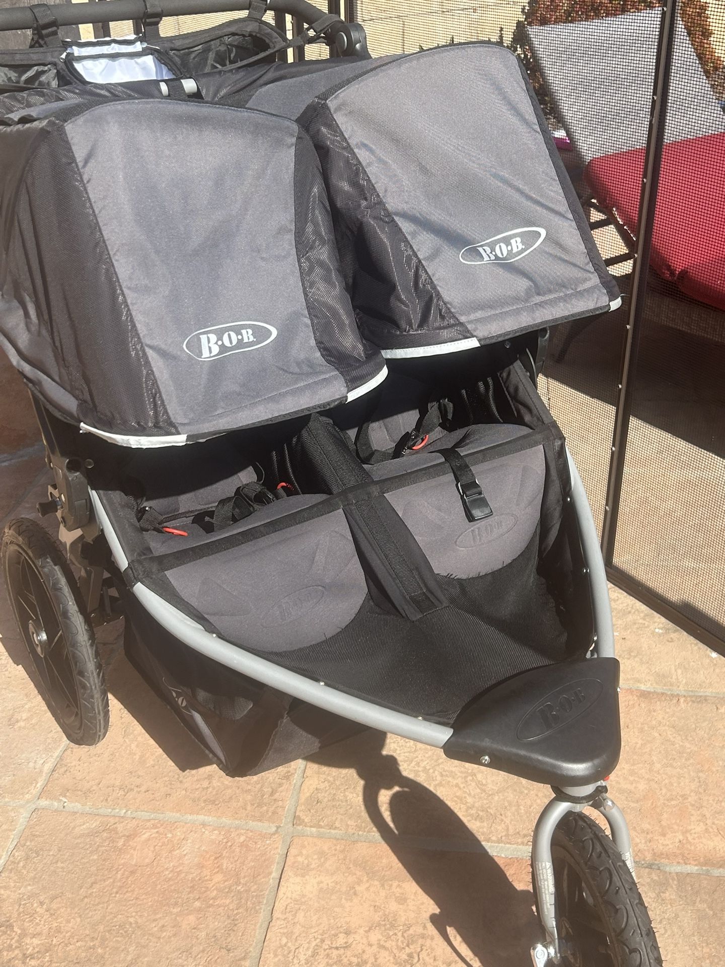 Double Bob stroller With trays And large Parent Storage