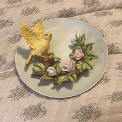 A Beautiful Bird Play With Purple Flowers