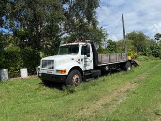 2000 International & 2017 Bobcat