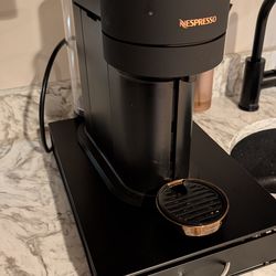 Nespresso Vertuo Next with milk frother and pod holder