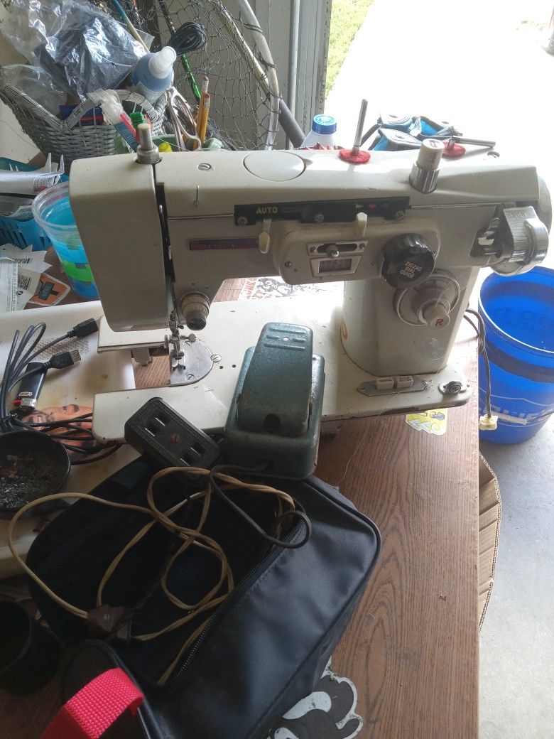 Sewing machine with flip pedal and seek