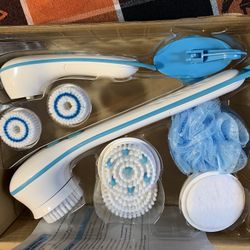 Idea Village spin spa deluxe spinning body brush kit. Cleansing facial brush set as seen on TV. Brand new and never used inbox. NIB 