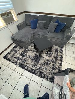 Couch turns into bed carpet and table included