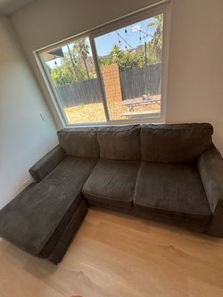 Living Spaces Gray Sectional