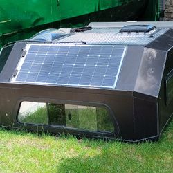 Black  Moonlander Truck Bed Camper 