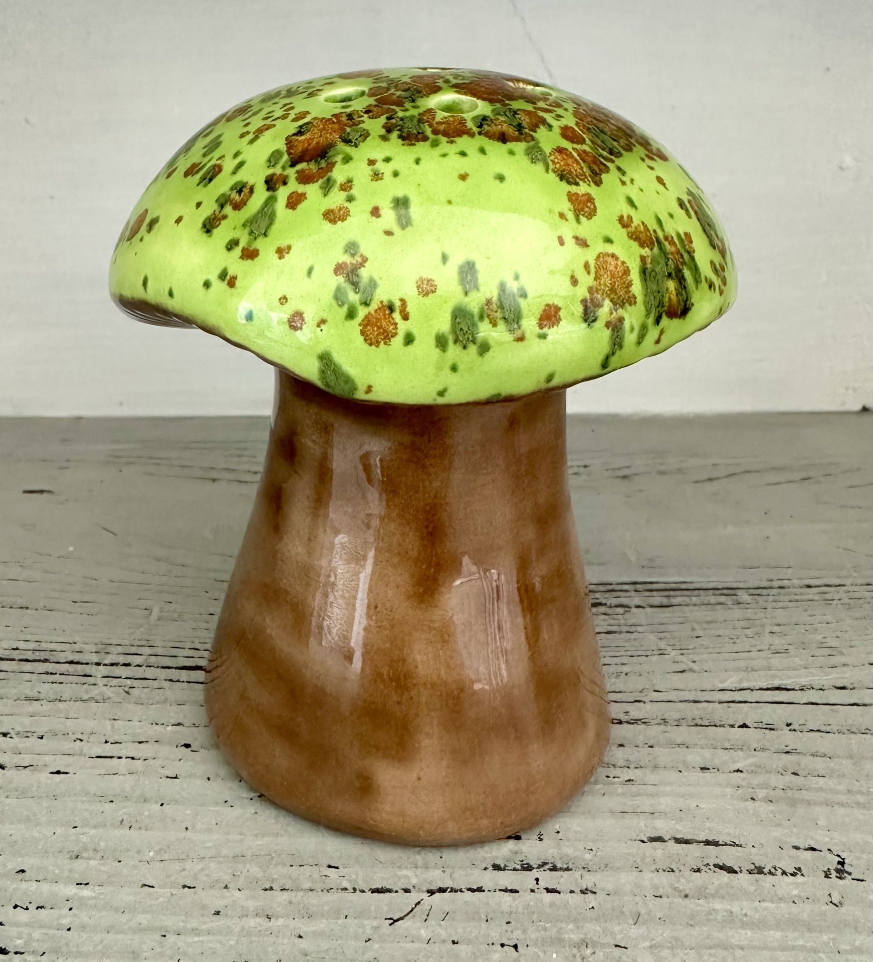 Vintage Ceramic Extra Large Mushroom Shaker. Green and brown drip glaze. 5” tall and about 4 1/2” across the top. Has rubber stopper in the bottom