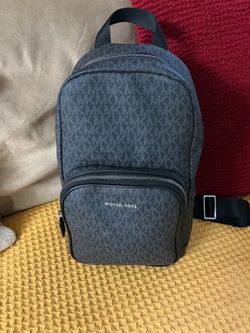 Michael Kors Cooper MK Signature PVC Commuter Slingpack Backpack!!  Almost new!
