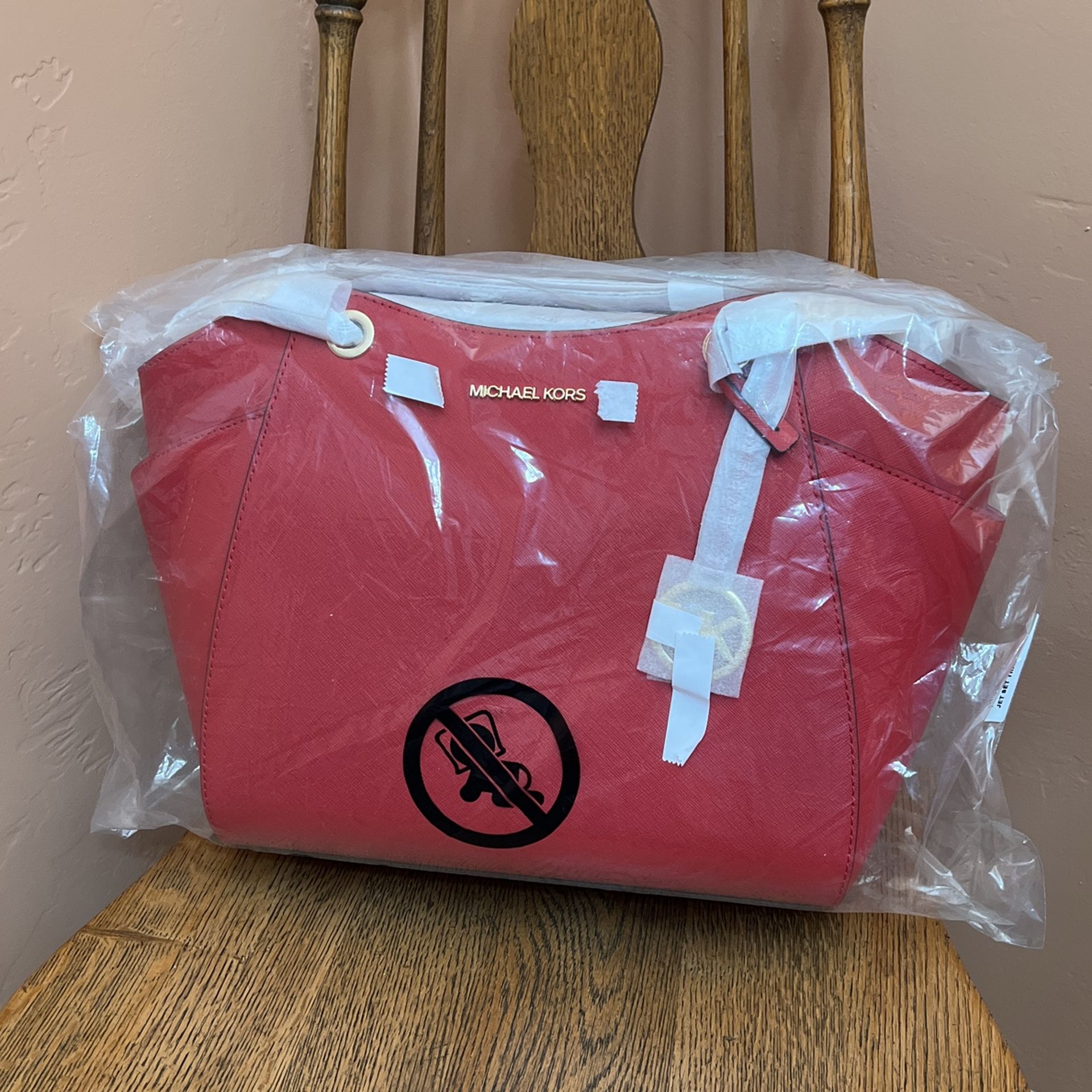 Michael Kors Jet Set Rouge Travel Bag