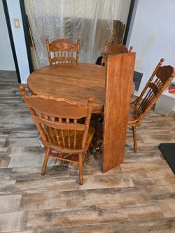 Table, chairs and leaf