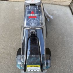 BISSELL Pet Stain Eraser PowerBrush portable carpet cleaner.