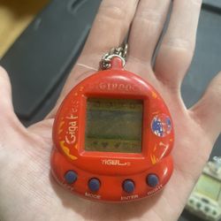 1997 Digipooch GigaPet distributed through kfc tiger electronics 