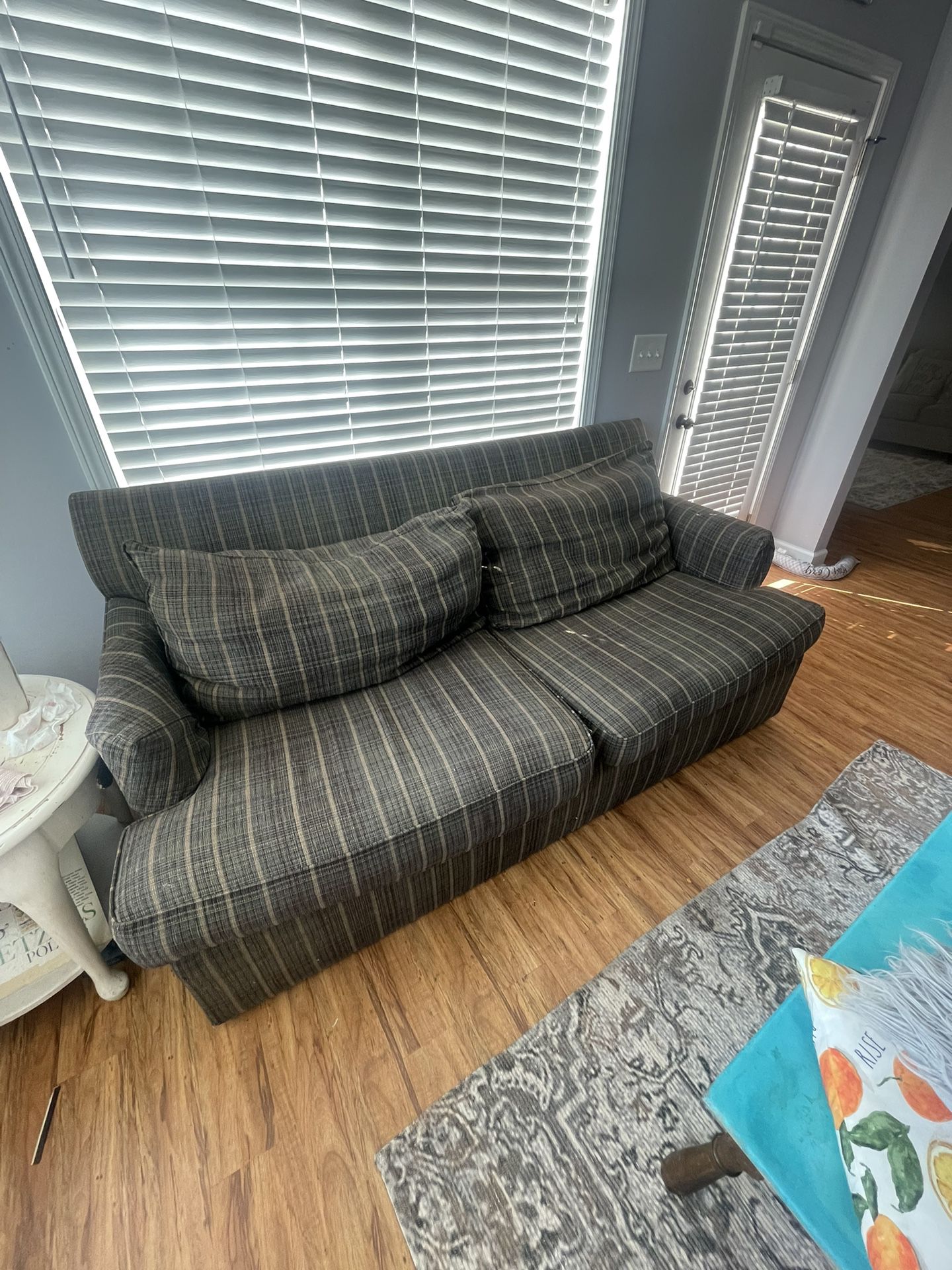 couch, chair with ottoman.. and rug for sale 