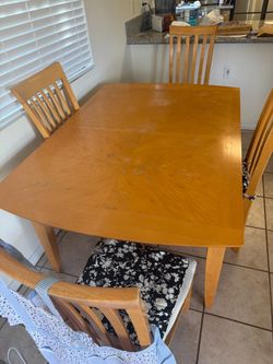 Table and chairs includes leaf