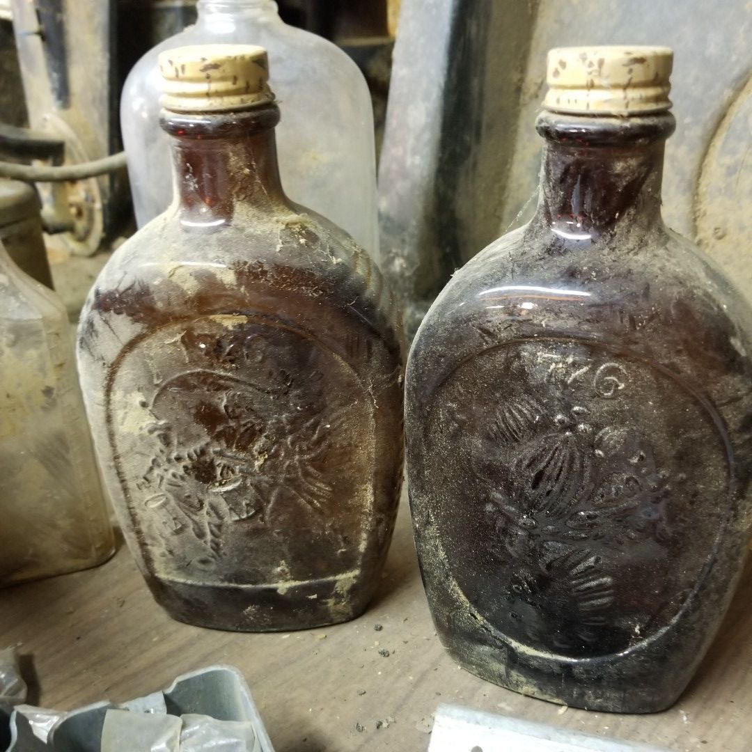 Antique bottles and tins