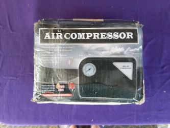 Mini air compressor new, box is beat up.