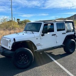 2016 Jeep Wrangler Unlimited Sport 4x4 Sport 4dr SUV Price $16,500 Mileage 106,015