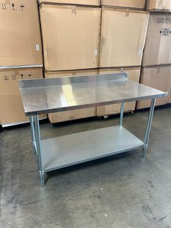 Stainless steel work tables with 4" professional grade backsplash NSF