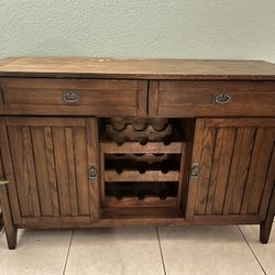 Red Oak Wood Finished Credenza Table With Drawers, Cabinets And Wine Storage