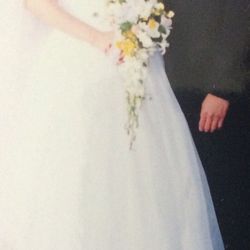 jessica mcclintock bridal gown so 7/8 with additional sequencing embellishments along waistline and covered buttons along zipper on back