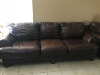 Brown leather 2 couches and one single couch