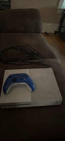 Xbox one s, with blue series s controller, and HDMI cord with the power Cord