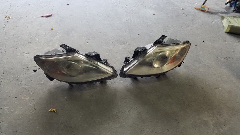 2010 Mazda cx9 parts headlights lf and rt and rear bumper cover
