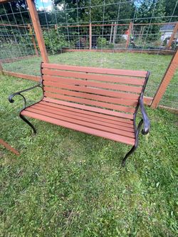 Wood and metal bench, good condition.