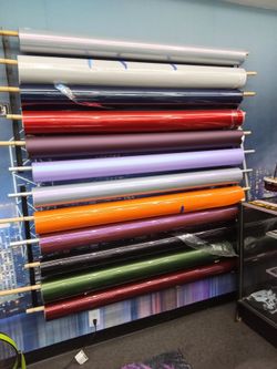Vinyl wrap rolls new, chrome , red , purple ,blue, green, black , orange , grey. Pink, pearl