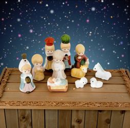 11 Piece Set 3" HOLIDAY MOMENTS Nativity Set Ceramic Figurines Holiday  Open Box.
The item is a vintage "Holiday Moments" 11-piece nativity set, likel
