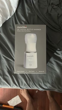 Brand New Sealed Bottle Warmer 