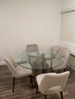 Round dining table with chairs