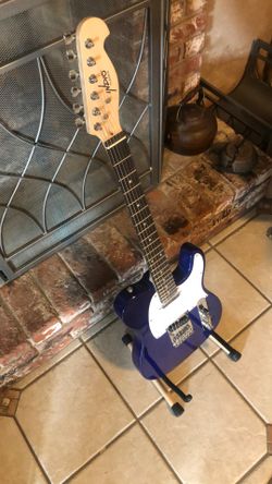 Indio Tele-style  Guitar,  Case Included,  Check out the reviews, it’s the the dark horse of guitars.