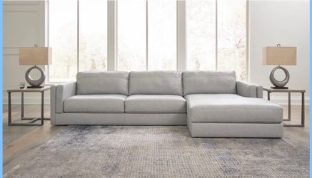 Genuine leather sectional by Ashley