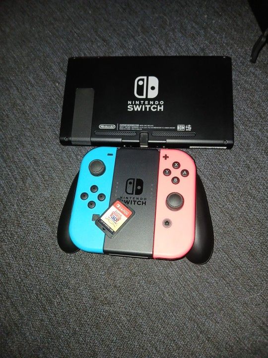 Nintendo Switch With Games And Controllers