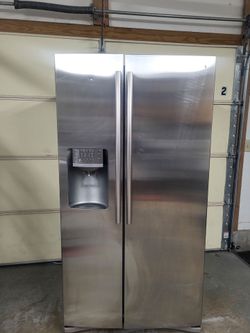 Samsung stainless steel side by side refrigerator (delivery available)