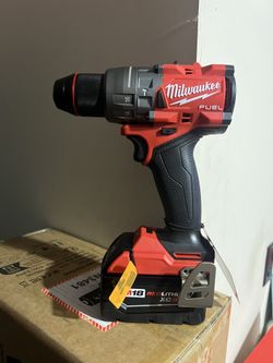 Milwaukee M18 Fuel Hammer Drill And Battery 