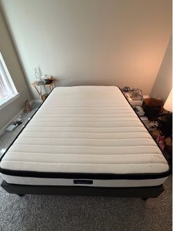 Queen Upholstered Platform Bed Frame with 10 inch Supportive Queen Mattress.
