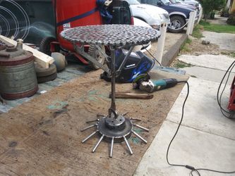 Art Metal made hand table hecha de flat washers
