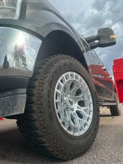 18x9 XM Rims And Tires 275/65/18 AT