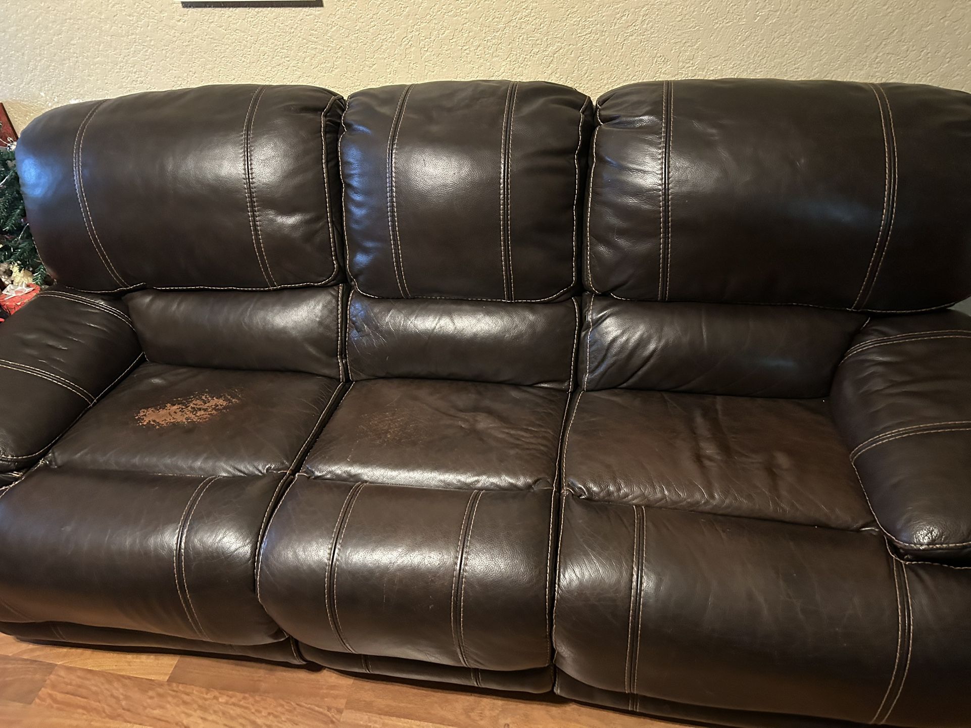 Brown electric Recliner Couch And Brown Leather Stain