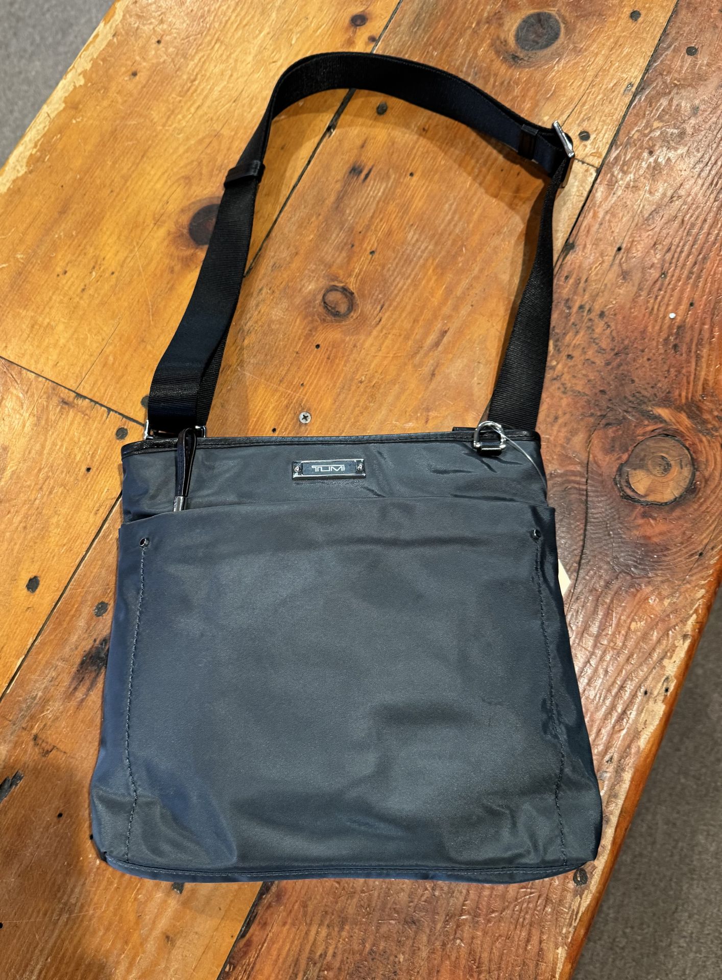 Tumi Gray Nylon Crossbody Bag with Black Leather Trim and Silver Accents