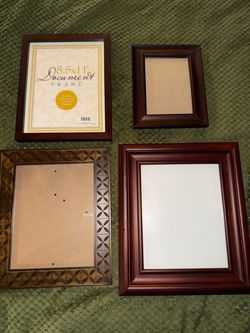 Four wooden glass picture frames