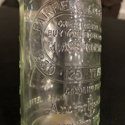 Bicentennial Bottle  Fairfield County Fair Souvenir  1   Compliments of Anchor Hocking Co.  Thomas Jefferson on front  6 1/4 inches high  