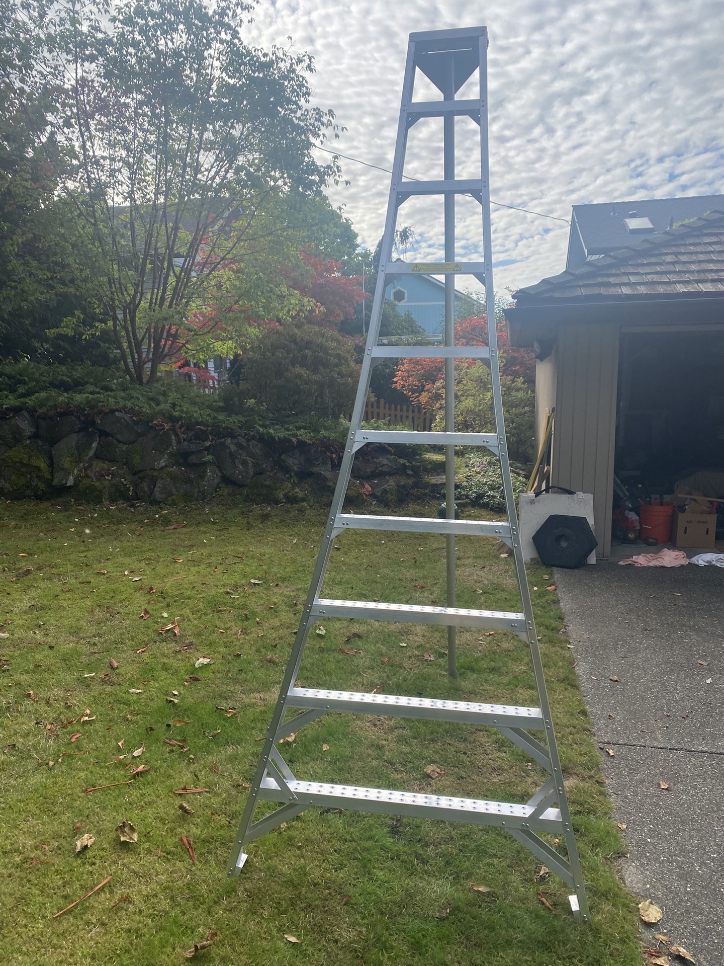 Like New Tallman Tripod Orchard, 10 foot ladder like new condition used only once made of lightweight aircraft quality aluminum