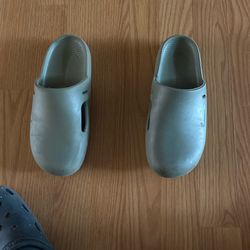 Nike Calm Mule in the Oil Green