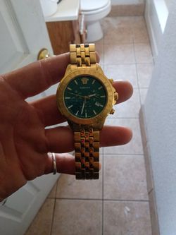 Versace green face watch