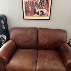 Red Leather Loveseat $100
