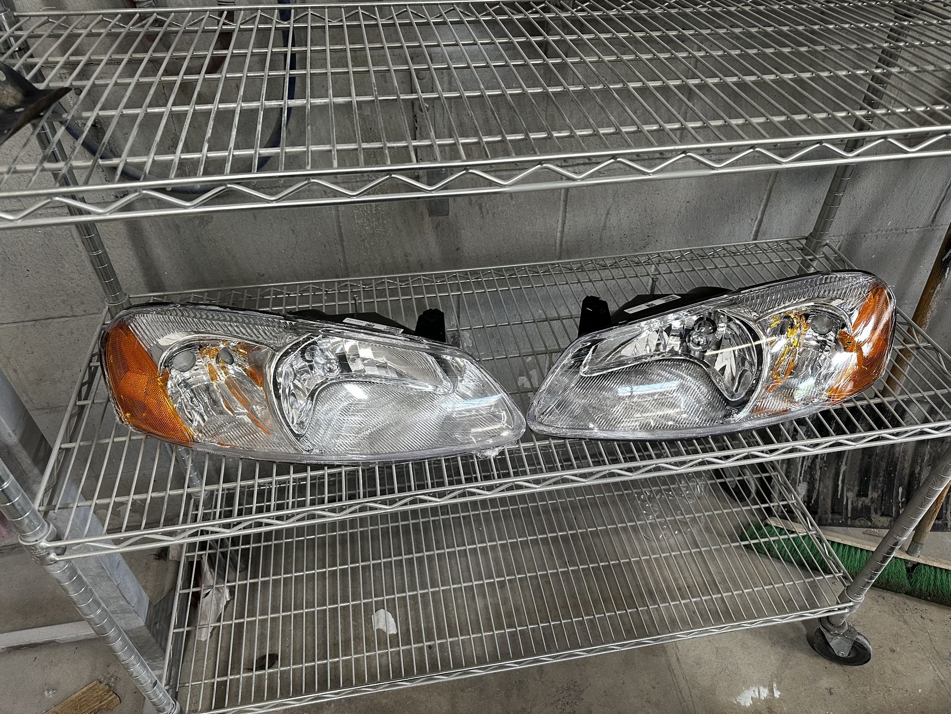 01-03 Chrysler Sebring/ Dodge Status Headlights