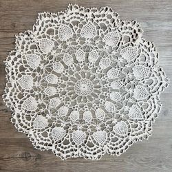 Vintage round handmade crochet doily featuring intricate floral & pineapple 24”
